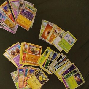 Pokemon Card Collection with Yellow and Green Highlights